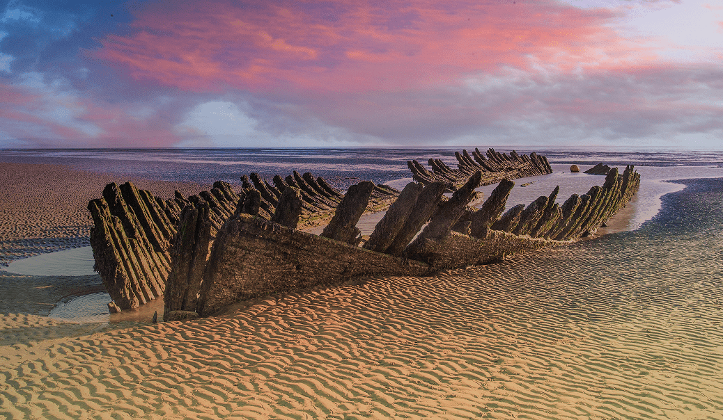 The skeletal remains of the SS Nornen shipwreck on Berrow beach, Somerset