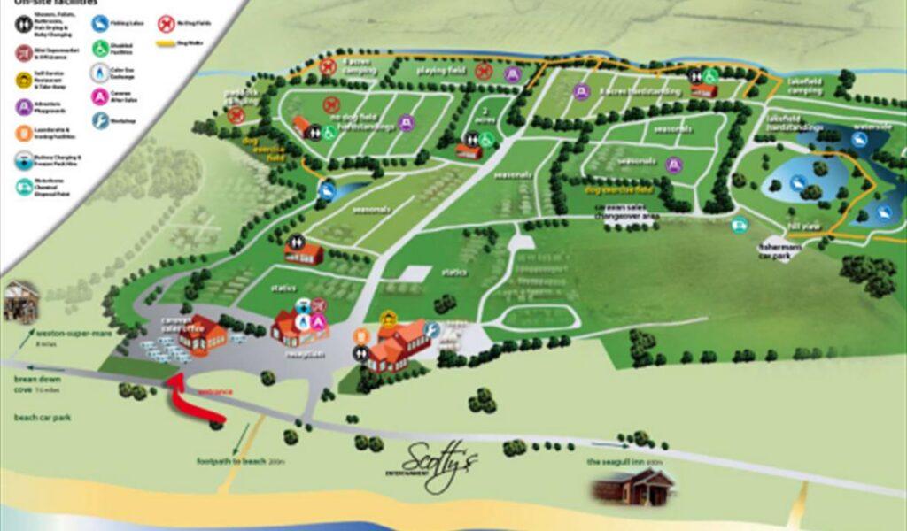 Map of a holiday park showing campsites, facilities, roads, and the beach entrance