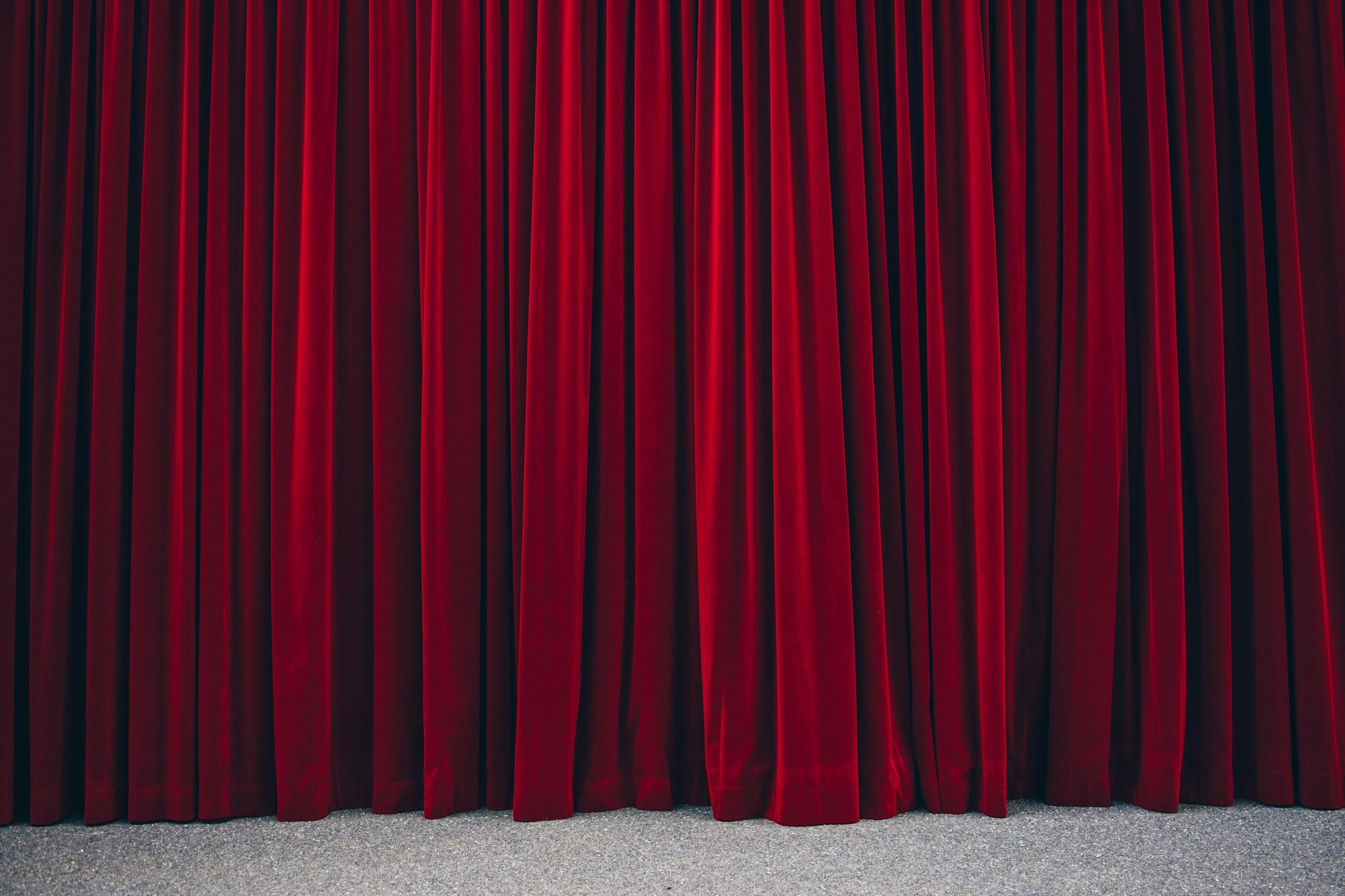 A red stage curtain.