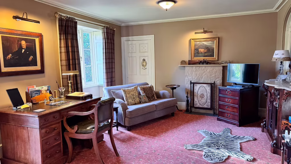 One of the rooms at Uphill Manor featuring a desk