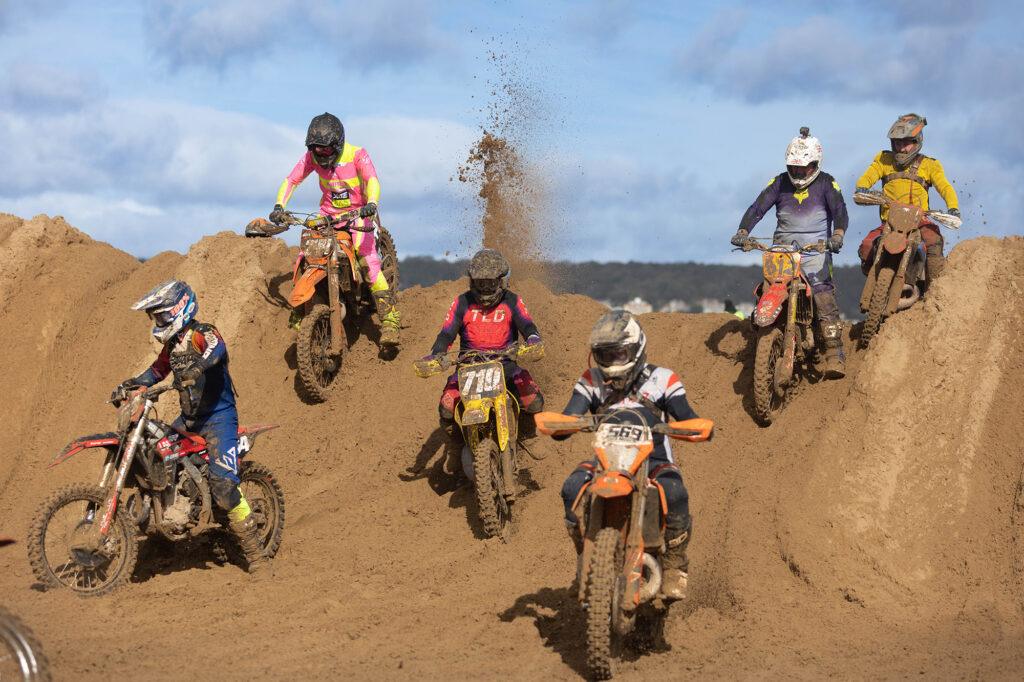 A group of six riders at the Weston Beach Race