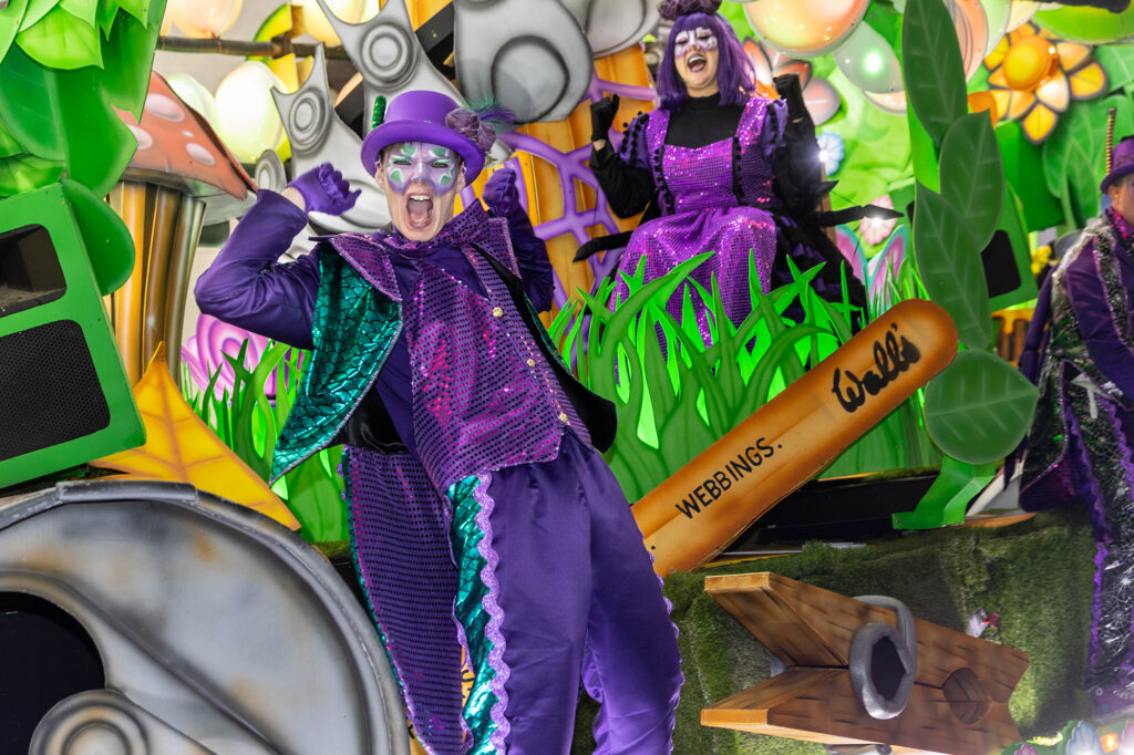 A performer dressed in purple on a float at the Weston-super-Mare Carnival