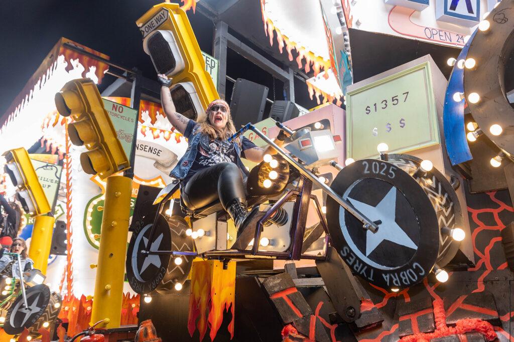 A Hells Angel motorbike rider on board a float at the Weston Carnival