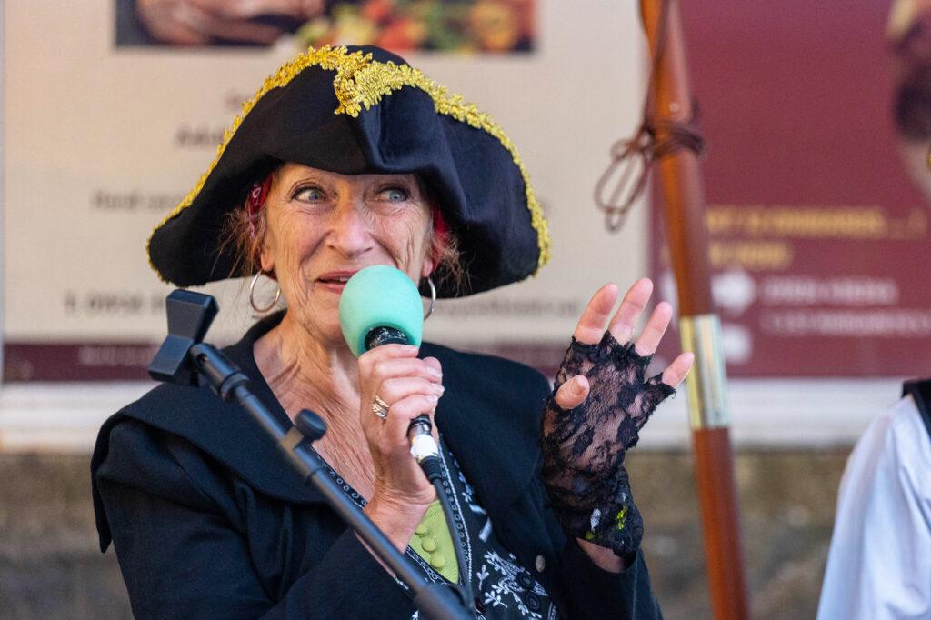 A female singer from the Brave Marauders band at the Weston-super-Mare Sea Shanty Festival