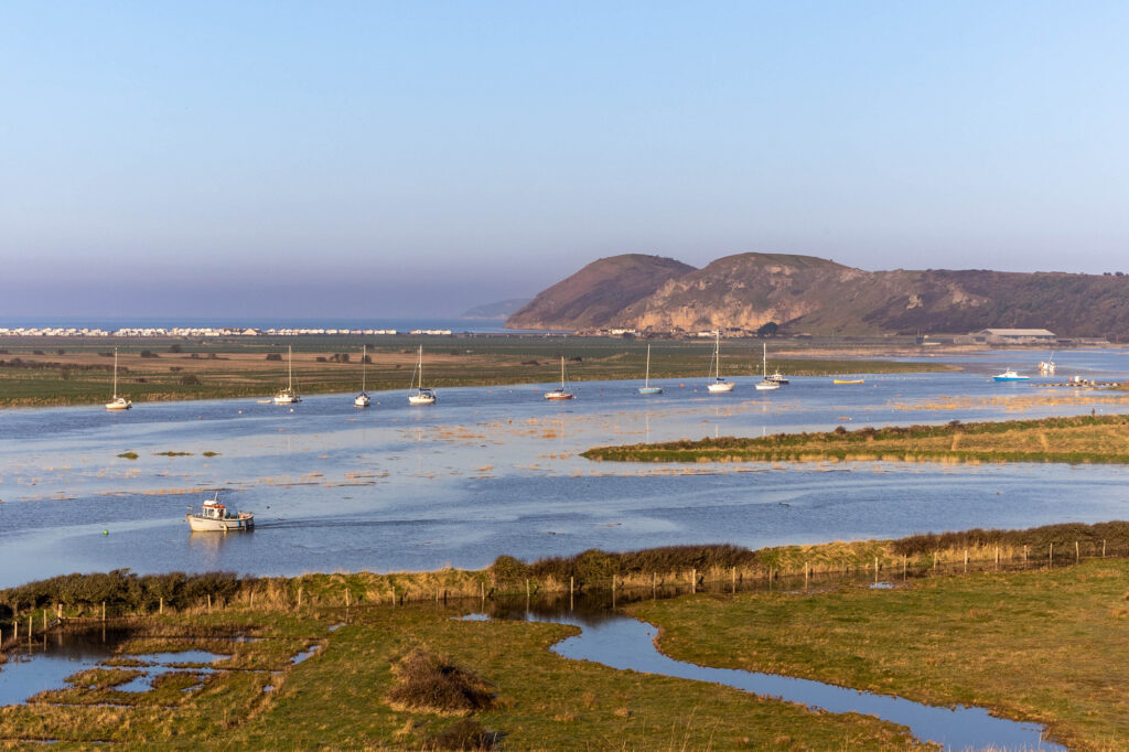 View of the River Axe estuary at Uphill ay high tide