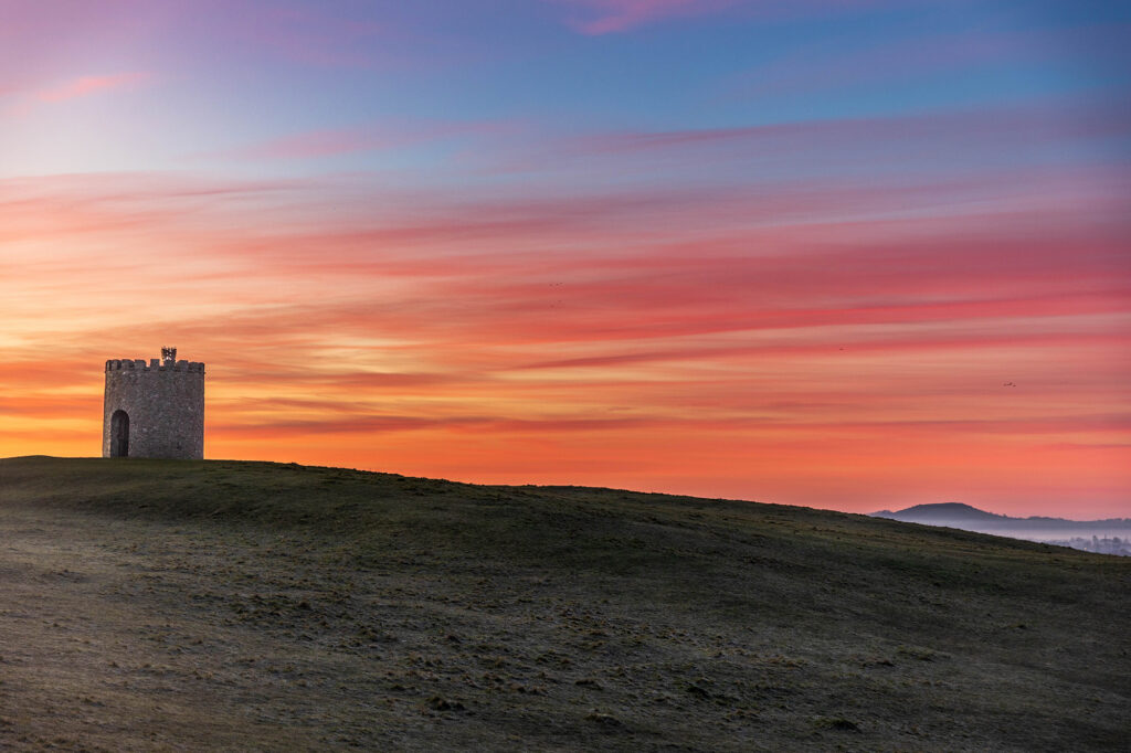 Dramatic sunrise over Uphill Beacon