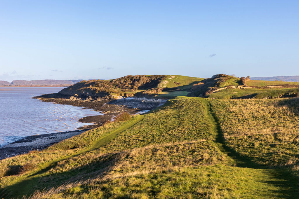 Grassy footpaths leading to Middle Hope Beach at Sand Point, near Weston-super-Mare