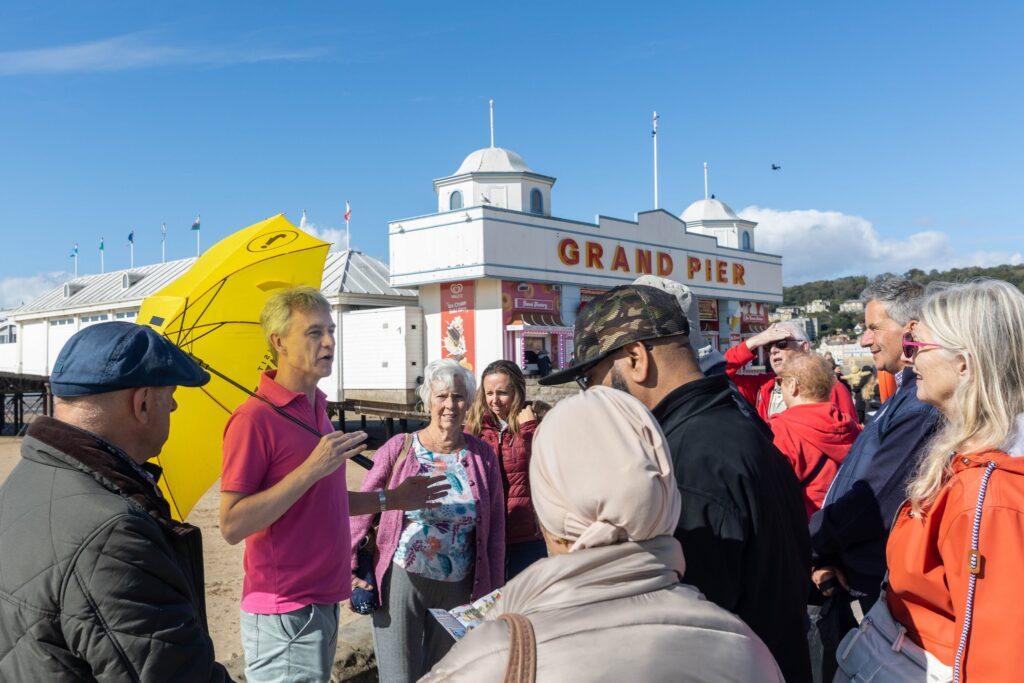 Weston-super-Mare walking group guide, Tony, leads a large group around Weston-super-Mare