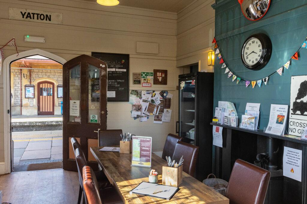 Looking out of the Strawberry Line Cafe at Yatton train station in Somerset through the arch framed door and onto the platform