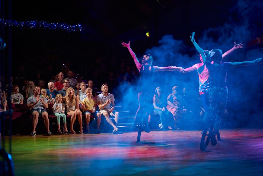 Families enjoying a show at Wookey Hole