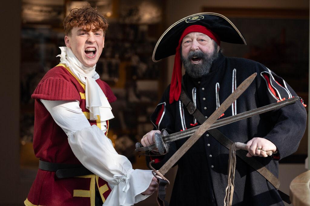 Pirates cross swords during a re-enactment day at Weston Museum