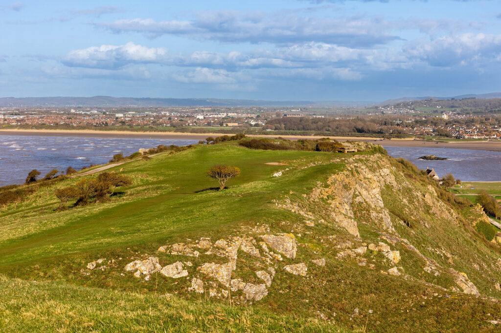 View from the headland at Brean Down looking over Brean Down and towards Weston-super-Mare