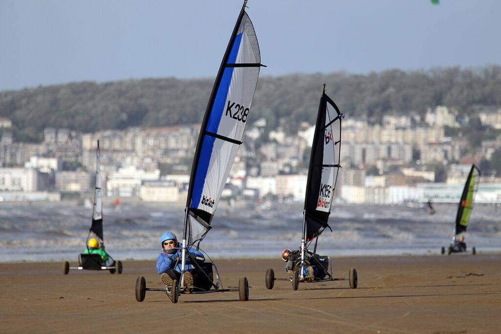 Blokarters race along the shoreline at Weston-supr-Mare