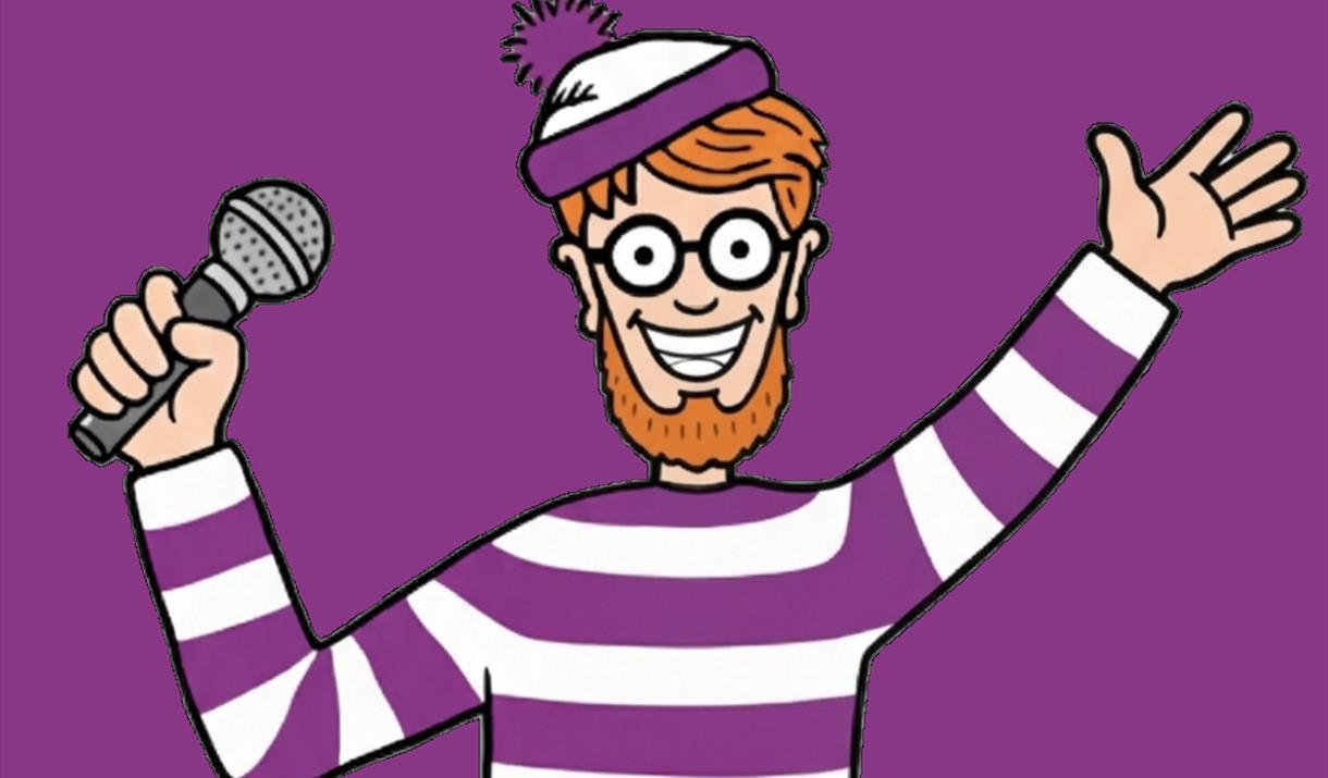 A cartoon of a man with a purple and white stripey jumper and bobble hat smiles and holds out one hand while the other hand holds a microphone