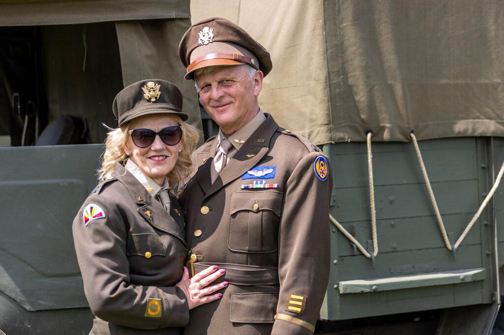 A man and a woman in brown servicemen's outfits at the Dig for Victory Show in North Somerset