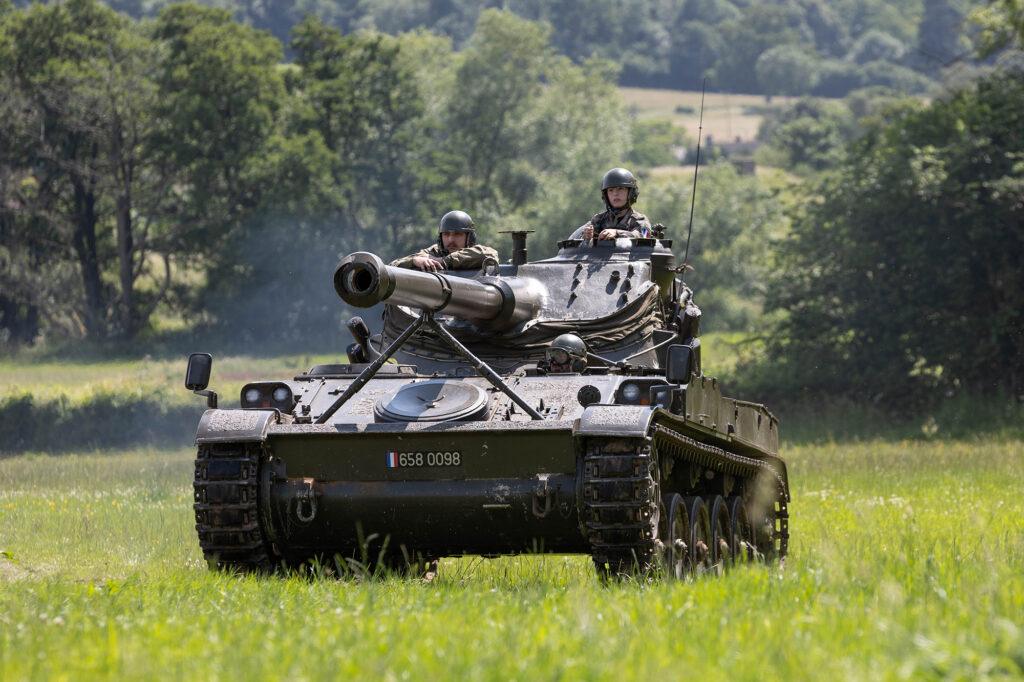 A tank being driven by two soldiers at the Dig for Victory Show in North Somerset