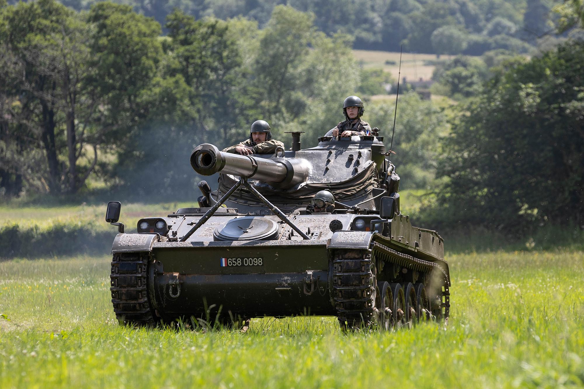A tank being driven by two soldiers at the Dig for Victory Show in North Somerset