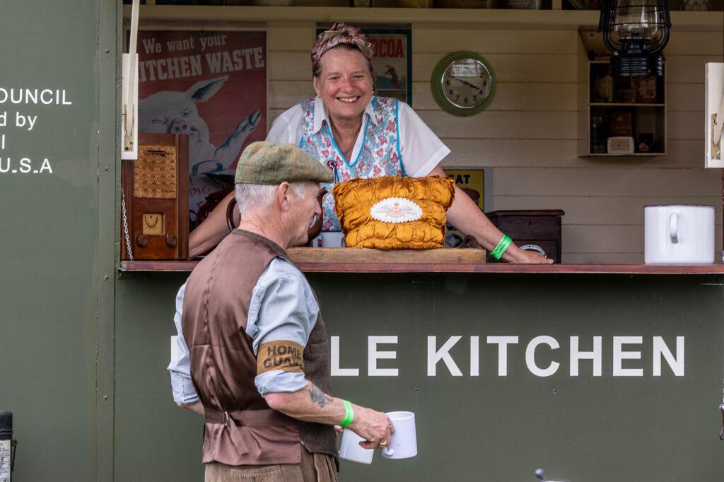 A Home Guard warden visiting the food wagon at the Dig for Victory Show in North Somerset