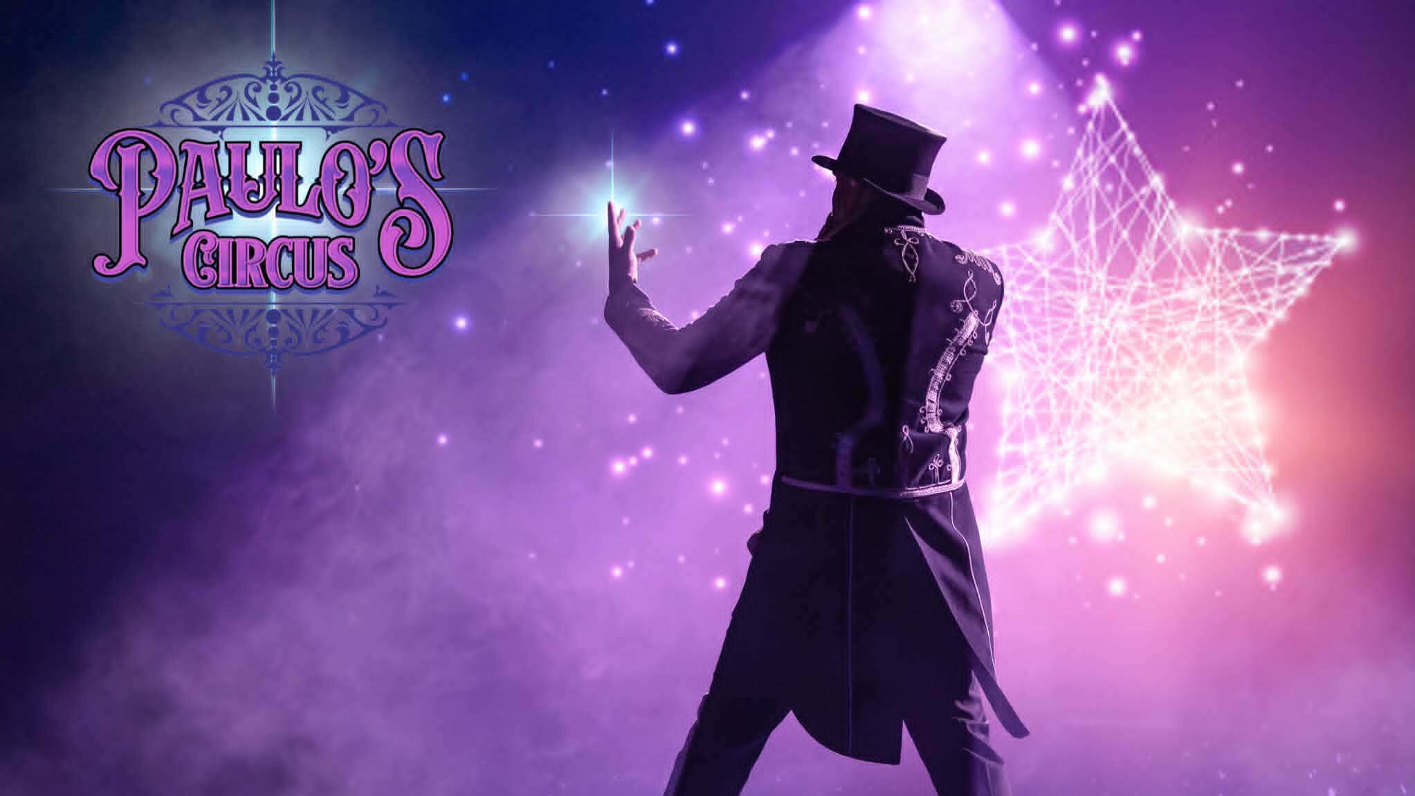 The silhouette of a magician over a star background